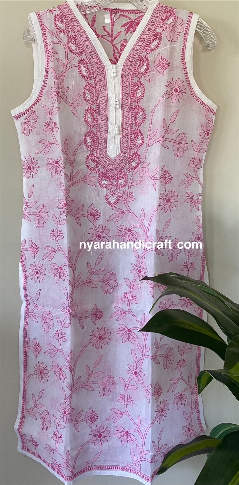 White dress for women with embroidery in double ikkat fabric.
