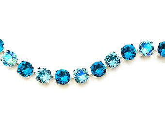 Swarovski® Crystal 8mm 'Tenderly Teal' Tennis Bracelet, Blues and greens shimmers in silver setting, Matching Necklace and Earrings