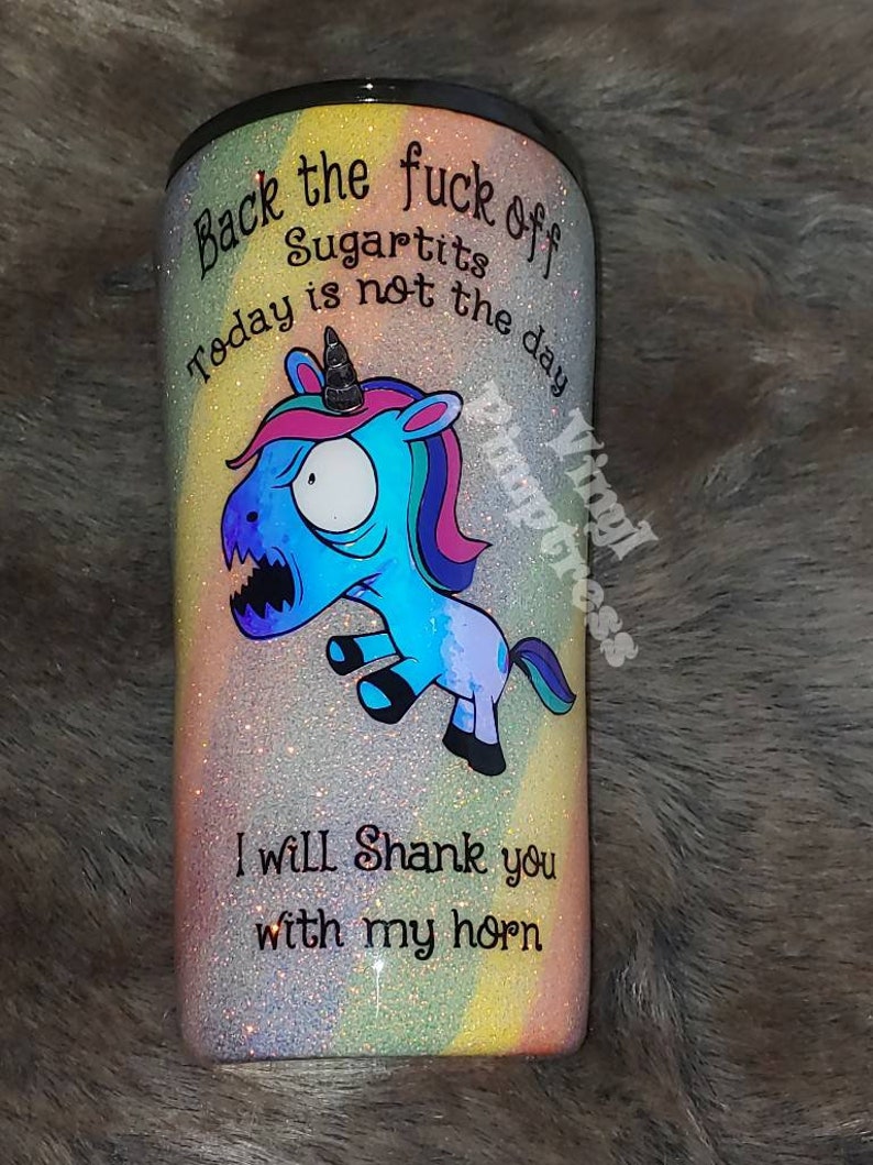 May include: Glittery tumbler with a rainbow gradient and a cartoon unicorn illustration. The text reads "Back the fuck off Sugartits Today is not the day" and "I will Shank you with my horn."