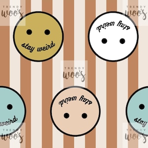 May include: A repeating pattern of smiley faces with the text "stay weird" in a handwritten font. The smiley faces are in various colors, including gold, white, and light blue, set against a striped background.