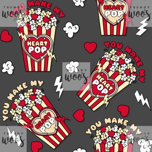 May include: A seamless pattern featuring a red and white striped popcorn bucket with a heart-shaped lid that says "Heart Pop". The bucket is filled with popcorn and hearts. The pattern also includes the text "You Make My Heart Pop" and lightning bolts.