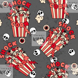 Peut inclure: Motif répété avec des boîtes de pop-corn avec les mots "SHOCK CORN" en rouge et blanc. Le pop-corn est rempli de crânes et de globes oculaires, avec des crânes et des globes oculaires supplémentaires éparpillés sur un fond gris.