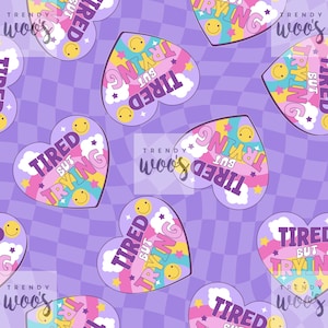 May include: A purple and white checkered background with a repeating pattern of pink, yellow, and blue hearts. Each heart has the text "TIRED BUT TRYING" with a rainbow and smiley faces.