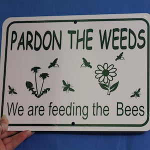 Pardon the Weeds  We are feeding the bees HORIZONTAL  Funny Garden Yard Sign Aluminum