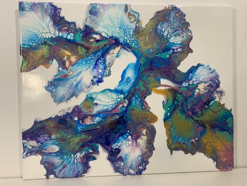 May include: Abstract painting on canvas with blue, green, purple, and gold paint. The paint has been swirled and layered to create a unique design.