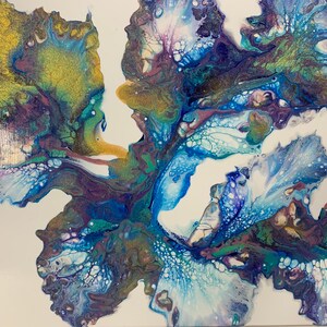 May include: Abstract painting with swirling blue, green, purple, and gold paint. The paint creates a flowing, organic design.
