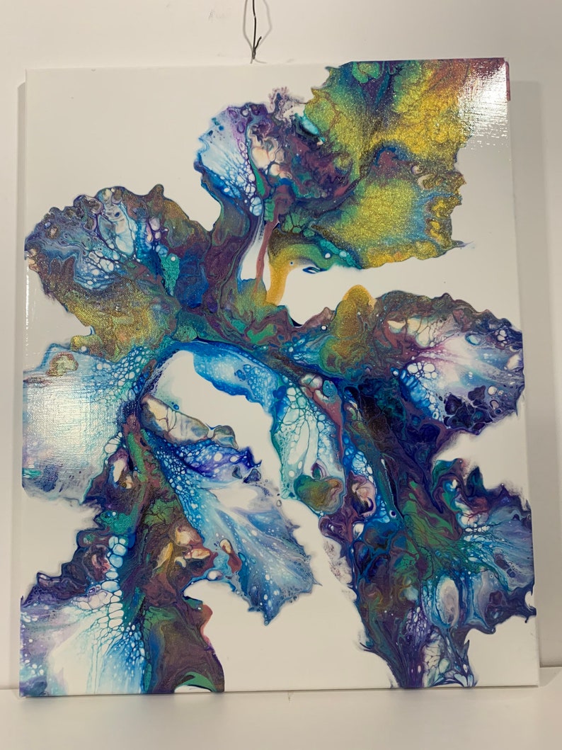May include: Abstract painting on canvas with swirling blue, green, purple, and gold paint. The colors create a flowing, organic design.