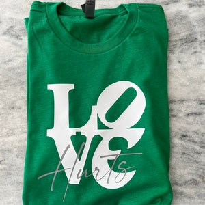 Love Hurts Eagles T-shirt: Kelly Green Philadelphia Football Tee