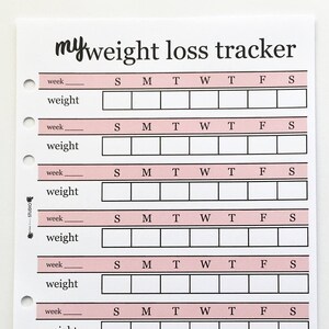 May include: A white weight loss tracker sheet with the text "my weight loss tracker" at the top. The sheet has pink boxes for tracking weight and the days of the week. The sheet is designed to be placed in a binder.