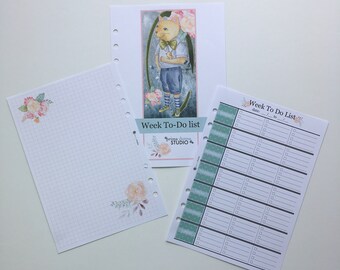 May include: A printable planner page with a weekly to-do list. The page has a light blue and white design with a floral pattern. The text "Week To Do List" is at the top of the page. The page is designed for use with a disc bound planner.