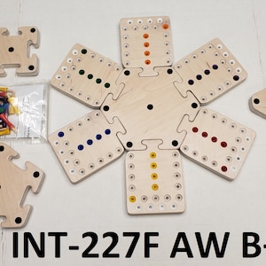 May include: A wooden game board with six square pieces that fit together to form a hexagon. Each square piece has a row of holes with colored pegs in them. The game board is labeled "INT-227F AW B+".