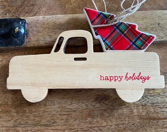 Camión de madera con árbol de Navidad