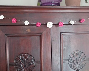 Crochet flowers garland. Led lights crochet flowers garland.