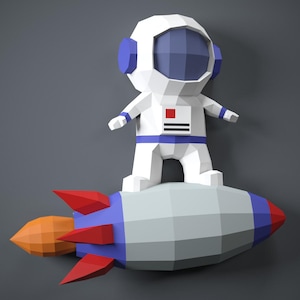 Astronaut op een raket Papercraft DIY ruimtevaarder PDF-sjabloon DXF-cameo