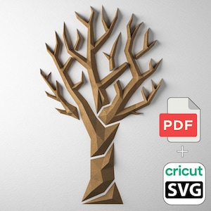 May include: A brown paper tree with a geometric design is displayed against a white background. The tree is accompanied by a PDF icon and a Cricut SVG icon, suggesting a digital design or template.