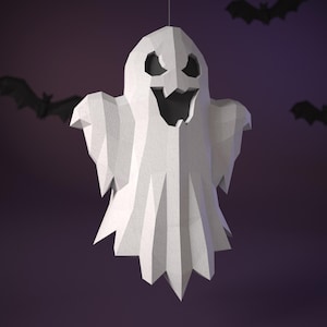 May include: A white, low-poly geometric ghost decoration with a jagged, angular design. The ghost features hollow, triangular eye sockets and a wide, open mouth. It is suspended in the air, surrounded by small, dark, silhouette-style bat shapes.