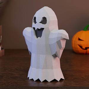 May include: A low-poly white ghost figurine with a jagged, geometric surface texture. The ghost features dark, triangular eye cutouts and a wide, open mouth with sharp, pointed teeth, creating a stylized, angular appearance for this spooky decor.