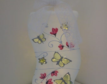 Unusual shaped lamp hand painted in white, with pink blossom & butterflies.