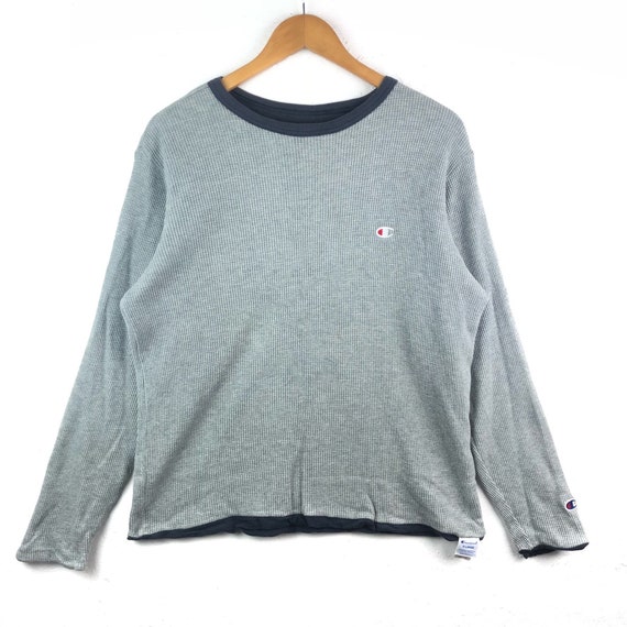 champion jumper small logo