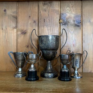 5 vintage trophies (188) silver plate trophies, small trophy, trophies, sporting items, sports, cups, medals, trophy cups