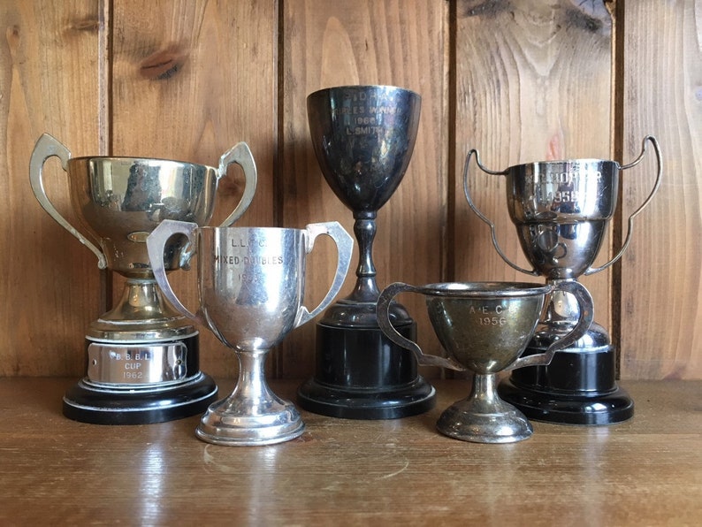 sports trophies vintage collection of 5 silver plate sporting trophies sporting items medals cups trophy