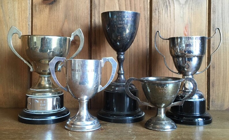 sports trophies vintage collection of 5 silver plate sporting trophies sporting items medals cups trophy
