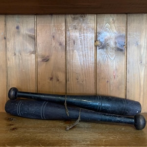 vintage pair of ebony wooden exercise clubs, exercise clubs, dumbbells