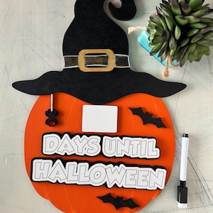 Letrero de cuenta regresiva de borrado en seco "Días hasta Halloween"