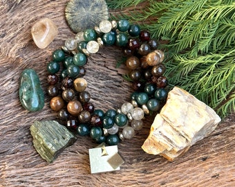 Yule Bracelet- Petrified Wood, Bronzite, Hessonite Garnet, Moss Agate, Pyrite and Gold Rutile in Quartz Bracelet Yoga. Meditation mala Bead
