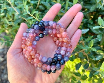 CRYSTAL WITCH Bracelet- Rhodochrosite, Sunstone, Strawberry Quartz, Ruby, gem Lepidolite, Iolite & Tigers Eye crystal bracelet