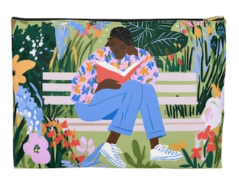 Woman Reading on Park Bench Accessory Pouch | Black Book Lover Floral Bag
