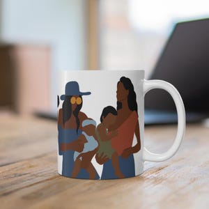 Mug noir Maternité artistique : maman mélanique qui allaite et allaite Vibe