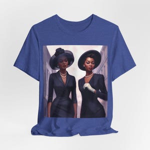 May include: Two women in black suits and hats walk down a street. They are both wearing pearl necklaces and one is wearing white gloves.