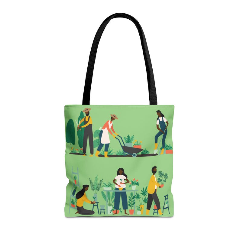 May include: A green tote bag with a black handle featuring a garden scene. The illustration shows people gardening with plants, a wheelbarrow, and gardening tools. The bag is made of a durable material.