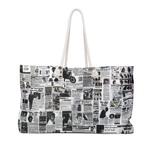 May include: A white tote bag with white rope handles. The bag is covered in a black and white newspaper print with headlines like "WIN", "ECZEMA", "MIAMI", "HAIRPIECES", and "nips pimples in the bud".