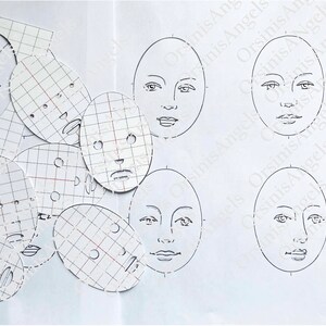 May include: A set of oval-shaped face templates with grid patterns and a few blank faces drawn on a white sheet of paper. The templates are used for drawing faces.