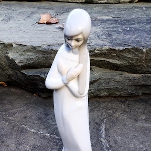 Vintage Casades Girl Standing in Prayer with Hands Crossed, Spain