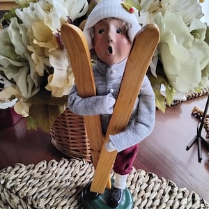 Vintage Byers Choice Caroler Boy Holding Eood Skis Figurine 1995, 5/100 Signed Byers 95