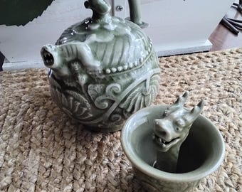 Vintage Chinese Celadon Reverse Flow Teapot and Gluttony Cup, Foo Dog Dragons Magic Teapot