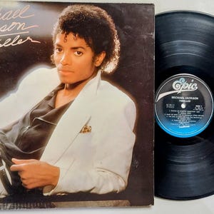 Vintage 1982 Vinyl Record Album by Michael Jackson titled Thriller