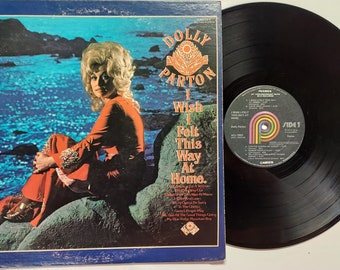 Vintage 1975 Vinyl Record Album by Dolly Parton titled I Wish I Felt This Way At Home