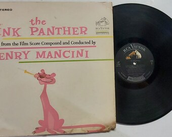 Vintage 1963 Vinyl Record Album by Henry Mancini titled The Pink Panther (Music From The Film Score)