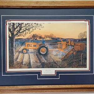 Framed  in Oak 21 x 27 in Oak Allis Chalmers  art Print titled Allis Glow by Russell Sonnenberg.