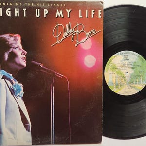 Vintage 1977 Vinyl Record Album by Debby Boone titled You Light Up My Life