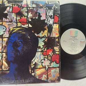 Vintage 1984 Vinyl Record Pop Rock Album by David Bowie titled Tonight