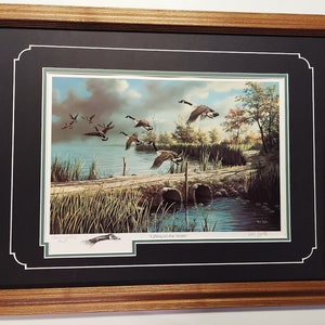 Framed & Matted  art Print Goose 21 x 27 by Ken Zylla Lifting to The North