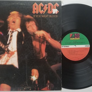 Vintage 1978 Vinyl Record Album by AC/DC titled If You Want Blood You&#39;ve Got It