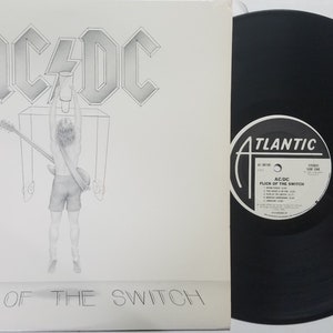 Vintage 1983 Vinyl Record Album by AC/DC titled Flick Of The Switch