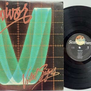 Vintage Vinyl Record Album 1984  by Survivor titled Vital Signs
