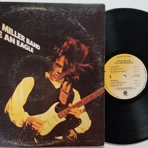 Vintage 1976 Vinyl Record Album by Steve Miller Band titled Fly Like An Eagle